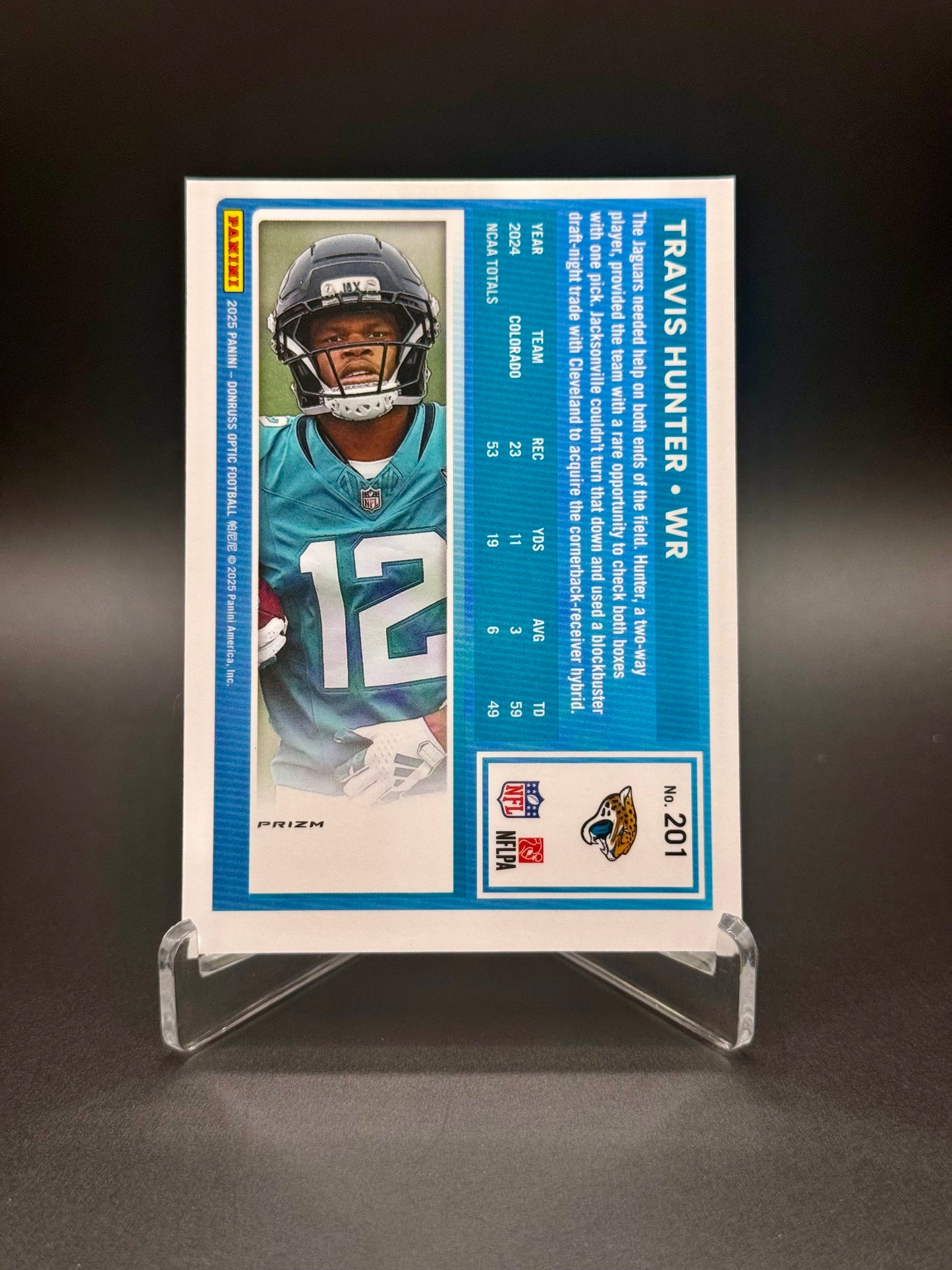 2025 Panini Donruss Optic Travis Hunter RC #201 Rated Rookie Purple Shock Raw