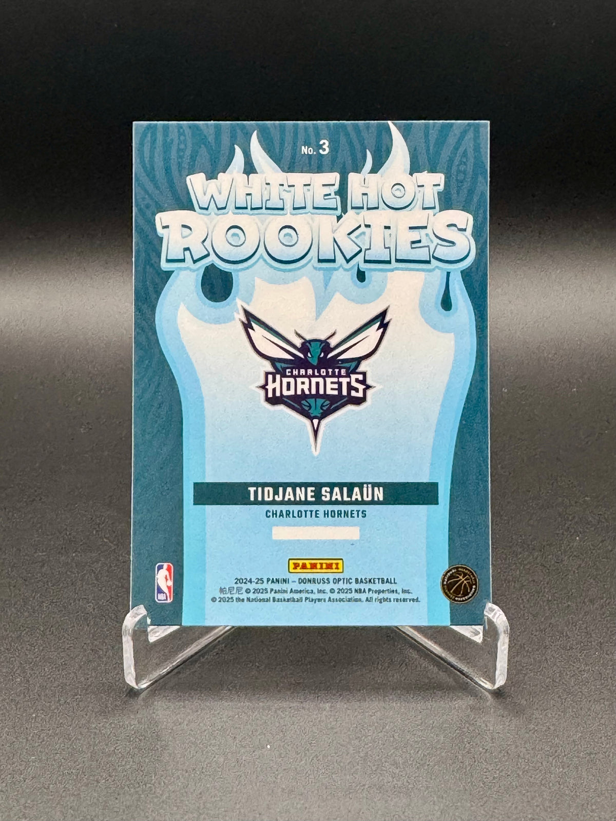 Back of 2024-25 Panini Donruss Optic Tidjane Salaün White Hot Rookies #3 rookie card
